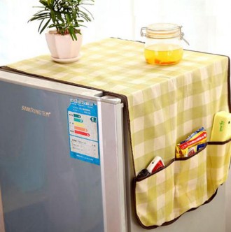 Функціональна накидка на холодильник оснащена декількома кишенями, в які можна п. . фото 4