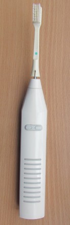 Электрическая зубная щётка Blend-a-dent с тремя насадками. Новая, но без коробки. . фото 4