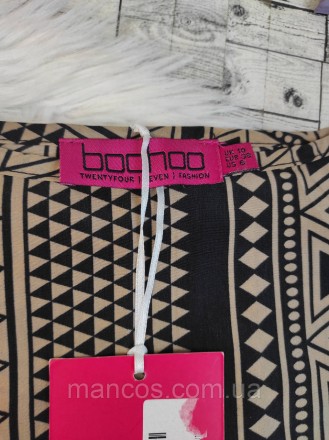 Женская блуза Boohoo коричневая с орнаментом с баской сзади удлинённая
Состояние. . фото 8