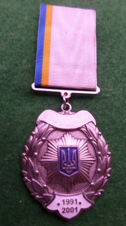 Медаль "Звезда Почета" является высокой наградой, которая выражает глубокую приз. . фото 2