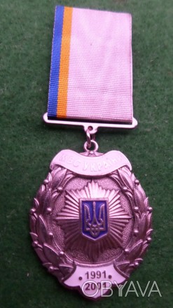 Медаль "Звезда Почета" является высокой наградой, которая выражает глубокую приз. . фото 1