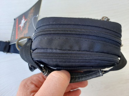Подростковая сумочка через плечо из плотной ткани

Практичная, хорошего качест. . фото 4