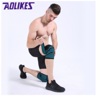 Спортивная повязка применяется для защиты колена при занятиях спортом и поднятии. . фото 2