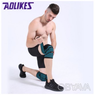 Спортивная повязка применяется для защиты колена при занятиях спортом и поднятии. . фото 1
