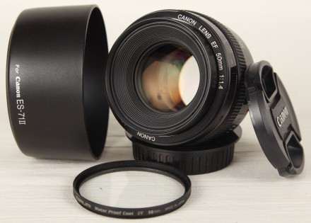 Продам объектив Canon 50 mm f/1.4 резкий с открытой диафрагмы.
Состояние (см.фо. . фото 3