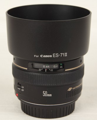 Продам объектив Canon 50 mm f/1.4 резкий с открытой диафрагмы.
Состояние (см.фо. . фото 2