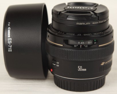 Продам объектив Canon 50 mm f/1.4 резкий с открытой диафрагмы.
Состояние (см.фо. . фото 5