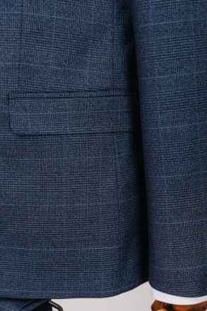 
ІНФОРМАЦІЯ ПРО ПРОДУКТ
Темно-синій чоловічий костюм у клітку: піджак та штани, . . фото 9