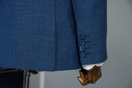 
ІНФОРМАЦІЯ ПРО ПРОДУКТ
Чоловічий костюм у синьому виконанні: класичний піджак т. . фото 7
