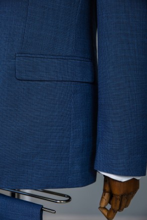 
ІНФОРМАЦІЯ ПРО ПРОДУКТ
Чоловічий костюм у синьому виконанні: класичний піджак т. . фото 8