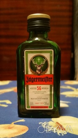 Редкая миниатюрная бутылочка зелёного стекла.

От немецкой спиртовой настойки . . фото 1