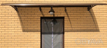 Металлический козырек/навес над дверью из монолитного поликарбоната 
ПОМОГАЕМ ВС. . фото 1
