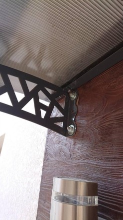 Металлический козырек/навес над дверью из монолитного поликарбоната 
ПОМОГАЕМ ВС. . фото 10