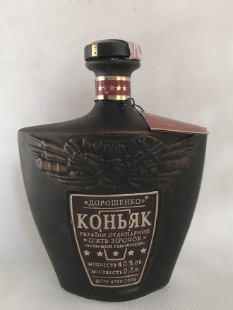 Коньяк Дорошенко пляшка кераміка.
Висота 19.5 см. Об'єм 0.5 л.
Нова, вигл. . фото 2