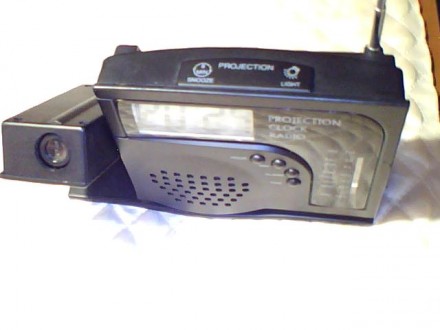 Электронный радиоприемник с часами и будильником 'murphy'
c установко. . фото 6