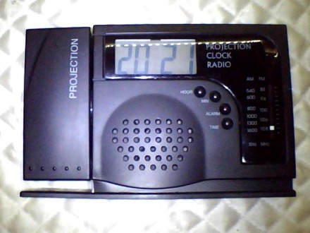 Электронный радиоприемник с часами и будильником 'murphy'
c установко. . фото 3