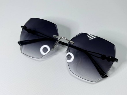 Солнцезащитные женские очки геометрические безоправные
защита от ультрафиолета u. . фото 3