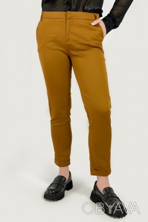 
Минималистичные женские брюки из смесового хлопка. Материал хорошо держит форму. . фото 1