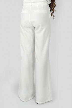 
Трендовые женские брюки широкого кроя с карманами. Выполнены из гладкой прочной. . фото 4