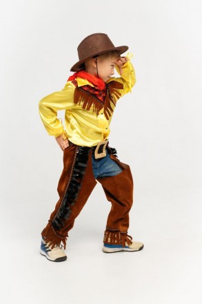 Детский карнавальный костюм Ковбой.
В комплект входит: 
	Накидка на штаны ( одев. . фото 2