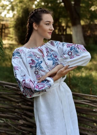 
Довга біла сукня
Оригінальний квітковий орнамент у стилі петриковського розпису. . фото 8