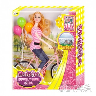 Лялька Барбі з велосипедом XM800