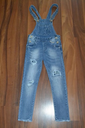 
НОВИНКА,стильні,модні,зручні джинсові комбінезони з оригінальними потертостями,. . фото 2