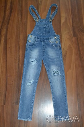 
НОВИНКА,стильні,модні,зручні джинсові комбінезони з оригінальними потертостями,. . фото 1