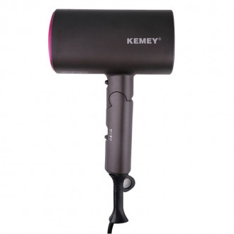 Эффективный и бережный к волосам – портативный фен Kemei KM-9945
Фен для волос K. . фото 2