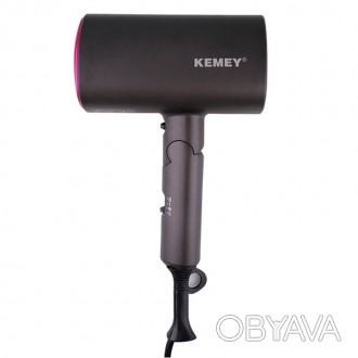 Эффективный и бережный к волосам – портативный фен Kemei KM-9945
Фен для волос K. . фото 1