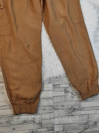 Женские брюки Amisu коричневого цвета с манжетами и с карманами 
Состояние: б/у,. . фото 4