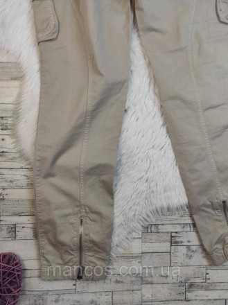 Женские брюки Benetton бежевого цвета с накладными карманами
Состояние: б/у, в о. . фото 6