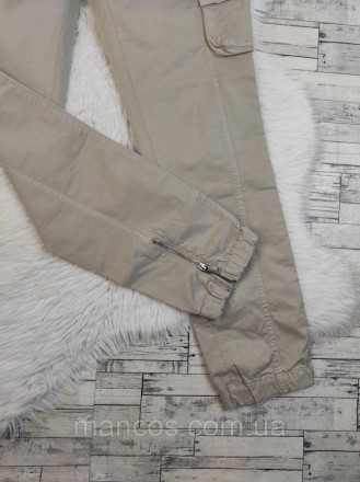 Женские брюки Benetton бежевого цвета с накладными карманами
Состояние: б/у, в о. . фото 4