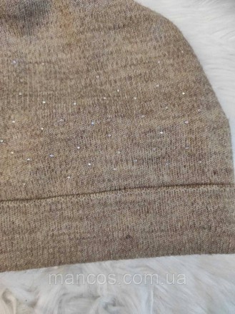 Женская зимняя шапка коричневого цвета со стразами на флисе
Состояние: б/у, в оч. . фото 4