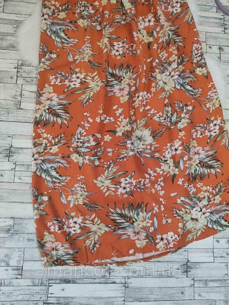 Женская длинная юбка оранжевая с цветочным принтом с высоким разрезом 
Состояние. . фото 4