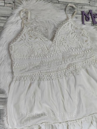 Женская летняя блуза Blind date молочного цвета с кружевом спинка резинка
Состоя. . фото 3