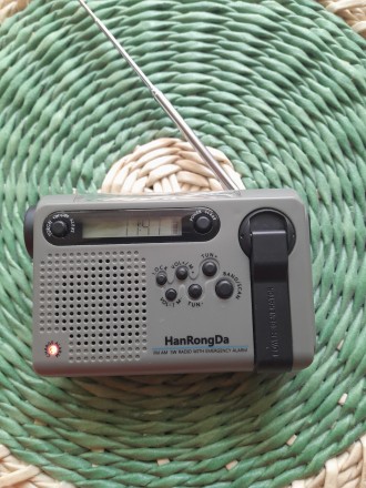 Новий, в упаковці, аварійний всехвильовий радіоприймач HanRongDa HRD-900.

Пра. . фото 4