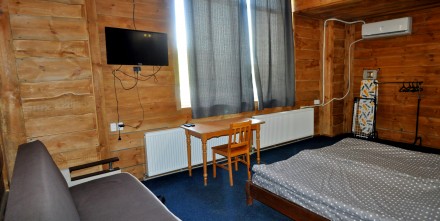 Квартира виконана в еко-стилі із зонуванням спальних місць, для більш комфортног. Кам'янець-Подільський. фото 4