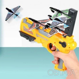 Дитячий іграшковий пістолет стріляючий літаками катапульта 4 шт Toy-Skew дальніс. . фото 1