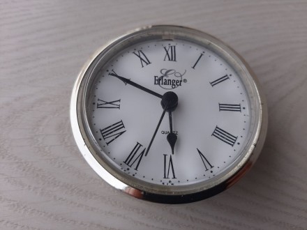 Настольные часы Erlanger (Винтаж, Германия)

Тяжелые
Ширина 12,7
Высота 8 см. . фото 6