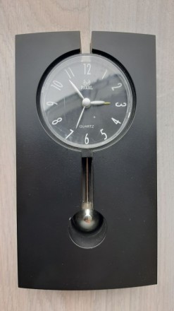 Настольные часы-будильник Pearl quartz, с маятником_1(черн)

Размер 18 Х 10 см. . фото 2