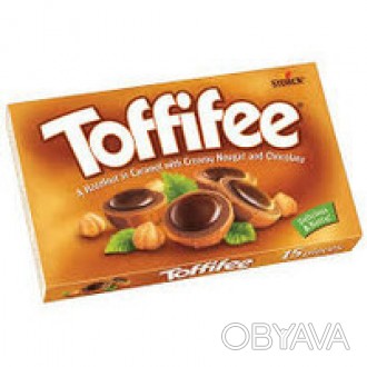 Конфеты шоколадные Toffifee 125г Лесной орех в карамельной чашечке с нугой и шок. . фото 1