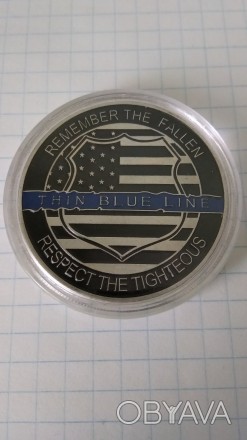 Памятна монета офіцер поліції