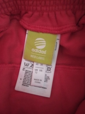 Хлопковая трикотажная юбка Adidas.
Цвет - красно- коралловый и желтый.
Талия н. . фото 4