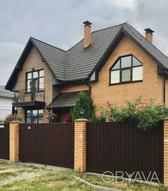 Сдам просторный дом 220 кв на участке 13 соток в с.Гатное. Гараж,терраса,ландшафтный дизайн