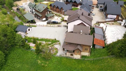 В центрі села Поляниця, на земельній ділянці площею 0.16 га знаходиться готельни. . фото 9