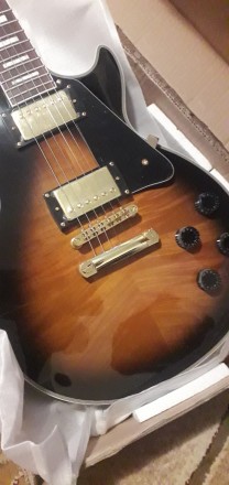 Электрогитара Gibson Les Paul Custom Tobacco 2 Sunburst China
В наличии или под . . фото 3