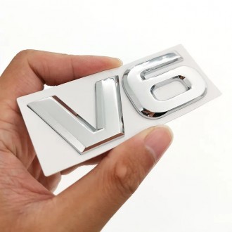 Шильд V6 значок емблема 6 циліндрів шильдик автомобіля авто
Напилення хром. На к. . фото 2
