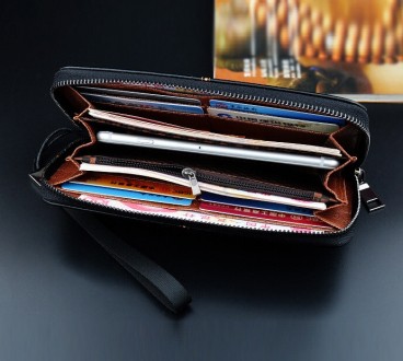 Мужской клатч кошелек на молнии с ремешком
Характеристики:
Материал: качественна. . фото 11