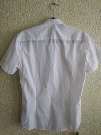 Белая мужская рубашка с коротким рукавом, р.С, Smog, Бангладеш .
ПОГ 49 см.
ПО. . фото 3